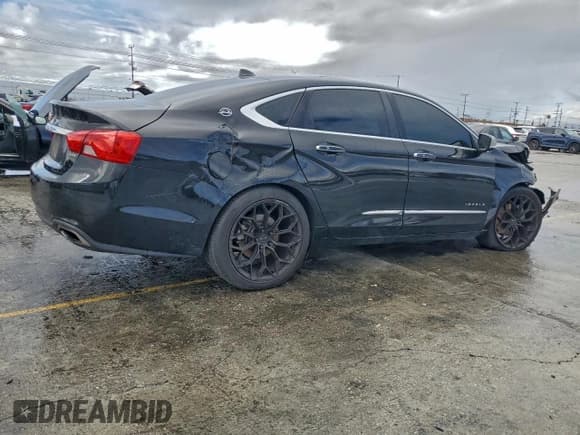 ✅ 2014 Chevrolet Impala LTZ • VIN: 2G1155S35E9221979 • Lot: 93498945. Listed on Copart with 129,516 mi. Free auction sales archive from the USA and detailed vehicle history report at DreamBid. Image 3.