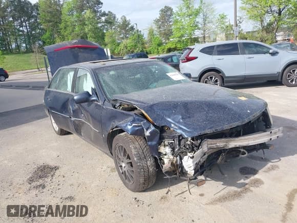 ✅ 2006 Cadillac DTS 1SB • VIN: 1G6KD57Y56U221359 • Lot: 42049935. Listed on IAAI with Not provided. Free auction sales archive from the USA and detailed vehicle history report at DreamBid. Image 6.