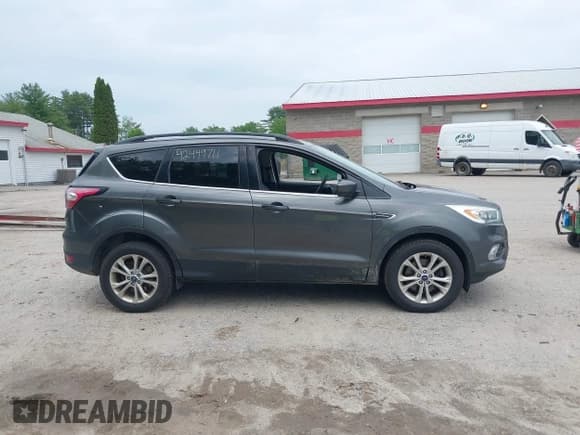 ✅ 2017 Ford Escape SE • VIN: 1FMCU9GD3HUD71233 • Лот: 42449711. Опубликован ранее на IAAI с пробегом 107 666 миль. Бесплатный доступ к архиву аукционных продаж из США и подробный отчёт об истории автомобиля на DreamBid. Изображение 13.