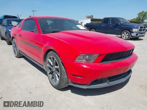✅ 2012 Ford Mustang GT Premium • VIN: 1ZVBP8CF5C5216031 • Lot: 42880817. Listed on IAAI with 127,381 mi. Free auction sales archive from the USA and detailed vehicle history report at DreamBid. Image 1.