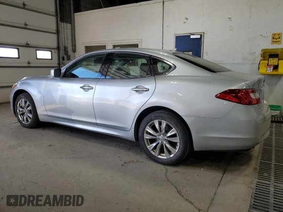 ✅ 2013 Infiniti M • VIN: JN1BY1ARXDM604922 • Lot: 90407875. Listed on Copart with 144,157 mi. Free auction sales archive from the USA and detailed vehicle history report at DreamBid. Image 2.