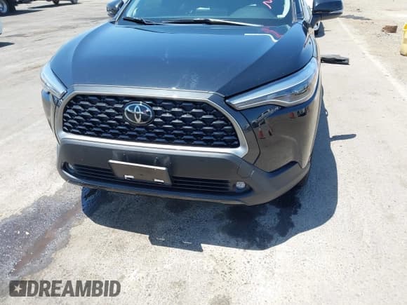 ✅ 2023 Toyota Corolla Cross XLE • VIN: 7MUDAAAG3PV069634 • Lot: 42489692. Listed on IAAI with 18,923 mi. Free auction sales archive from the USA and detailed vehicle history report at DreamBid. Image 13.