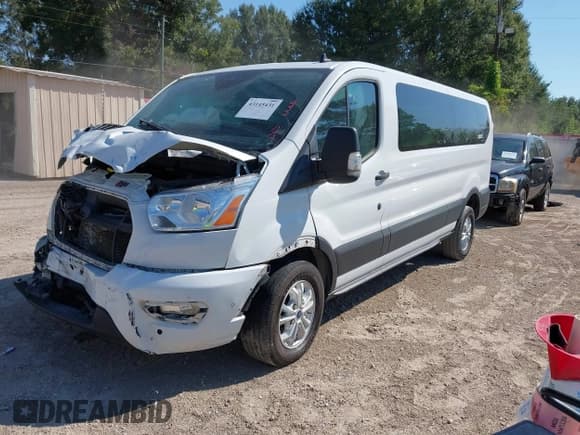 ✅ 2021 Ford Transit Passenger XL • VIN: 1FBAX2Y81MKA14767 • Lot: 43145431. Listed on IAAI with 130,886 mi. Free auction sales archive from the USA and detailed vehicle history report at DreamBid. Image 17.