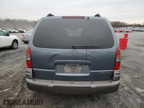 ✅ 2004 Pontiac Montana • VIN: 1GMDU03E64D159158 • Лот: 83805394. Опубликован ранее на Copart с пробегом 176 130 миль. Бесплатный доступ к архиву аукционных продаж из США и подробный отчёт об истории автомобиля на DreamBid. Изображение 6.