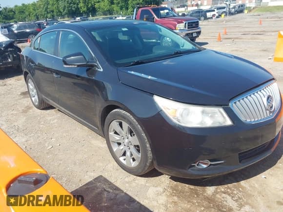 ✅ 2012 Buick LaCrosse Premium 3 • VIN: 1G4GH5E30CF192881 • Lot: 42657138. Wystawiony na IAAI z przebiegiem 164 514 mil. Bezpłatny archiwum sprzedaży aukcyjnych z USA i szczegółowy raport historii pojazdu na DreamBid. Zdjęcie 1.