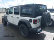 ✅ 2023 Jeep Wrangler • VIN: 1C4JJXN67PW630869 • Lot: 42170206. Wystawiony na IAAI z przebiegiem 56 384 mil. Bezpłatny archiwum sprzedaży aukcyjnych z USA i szczegółowy raport historii pojazdu na DreamBid. Zdjęcie 3.