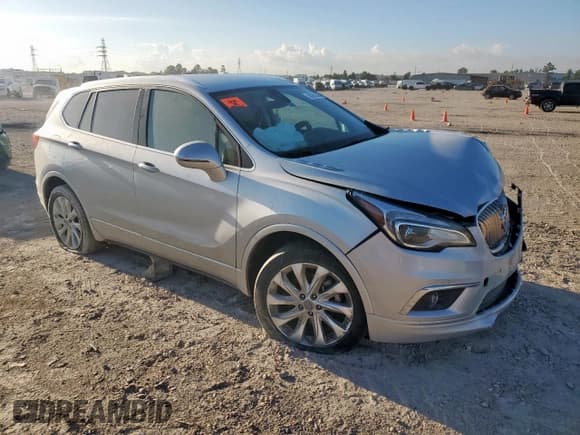 ✅ 2016 Buick Envision Premium I • VIN: LRBFXESX4GD235354 • Lot: 81061305. Listed on Copart with 141,990 mi. Free auction sales archive from the USA and detailed vehicle history report at DreamBid. Image 4.