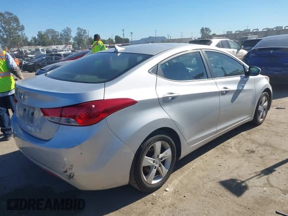 ✅ 2012 Hyundai Elantra GLS • VIN: KMHDH4AE5CU272287 • Lot: 43771253. Listed on IAAI with 164,210 mi. Free auction sales archive from the USA and detailed vehicle history report at DreamBid. Image 4.