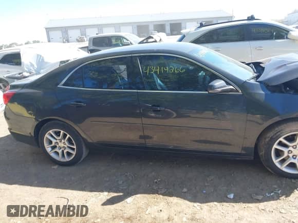 2015 Chevrolet Malibu LT z VIN 1G11C5SL6FF338694, wystawiony jako IAAI lot #43414226 z przebiegiem 107 248 mil mil oraz . Historia ofert i sprzedaży dostępna na DreamBid. Obrazek 13.