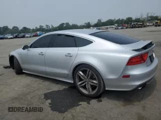 ✅ 2015 Audi RS 7 • VIN: WAUW2CFC5FN013049 • Lot: 57957093. Wystawiony na Copart z przebiegiem 95 826 mil. Bezpłatny archiwum sprzedaży aukcyjnych z USA i szczegółowy raport historii pojazdu na DreamBid. Zdjęcie 2.