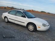 ✅ 1996 Ford Taurus G • VIN: 1FALP51U1TA243702 • Lot: 43843121. Wystawiony na IAAI z przebiegiem 132 222 mil. Bezpłatny archiwum sprzedaży aukcyjnych z USA i szczegółowy raport historii pojazdu na DreamBid. Zdjęcie 1.