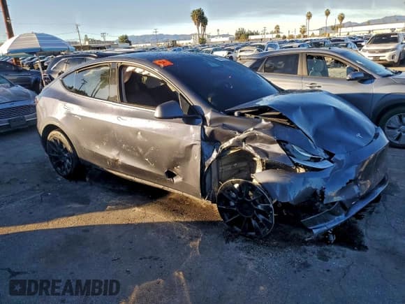 ✅ 2022 Tesla Model Y Long Range • VIN: 7SAYGDEEXNF494874 • Lot: 92753675. Listed on Copart with Not provided. Free auction sales archive from the USA and detailed vehicle history report at DreamBid. Image 4.