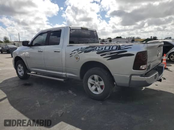 2015 Ram 1500 SLT with VIN 1C6RR6GG7FS517044, listed as a Copart auction lot 82760215 with 242,367 mi miles and Salvage title. Bid and sale history available at DreamBid. Image 2.