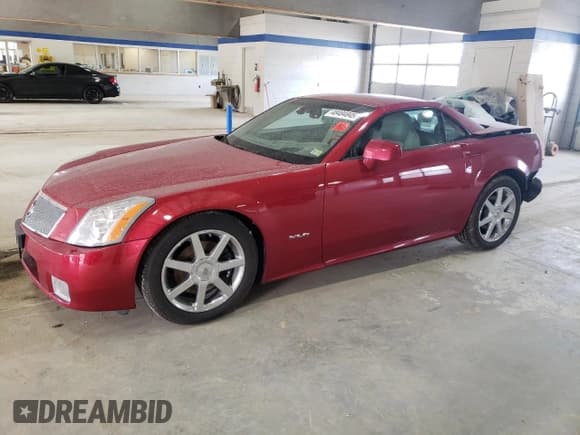 ✅ 2004 Cadillac XLR • VIN: 1G6YV34A045602305 • Lot: 48484845. Wystawiony na Copart z przebiegiem 52 897 mil. Bezpłatny archiwum sprzedaży aukcyjnych z USA i szczegółowy raport historii pojazdu na DreamBid. Zdjęcie 1.