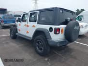 ✅ 2021 Jeep Wrangler Unlimited Sport S • VIN: 1C4HJXDN1MW648061 • Лот: 42426882. Опубликован ранее на IAAI с пробегом 99 008 миль. Бесплатный доступ к архиву аукционных продаж из США и подробный отчёт об истории автомобиля на DreamBid. Изображение 3.