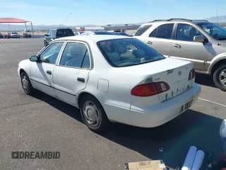 ✅ 1999 Toyota Corolla LE • VIN: 1NXBR12E0XZ196565 • Lot: 43670124. Listed on IAAI with 169,259 mi. Free auction sales archive from the USA and detailed vehicle history report at DreamBid. Image 3.