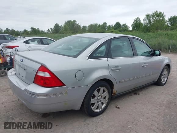✅ 2005 Ford Five Hundred SEL • VIN: 1FAFP24145G148659 • Lot: 42490163. Listed on IAAI with 164,738 mi. Free auction sales archive from the USA and detailed vehicle history report at DreamBid. Image 4.