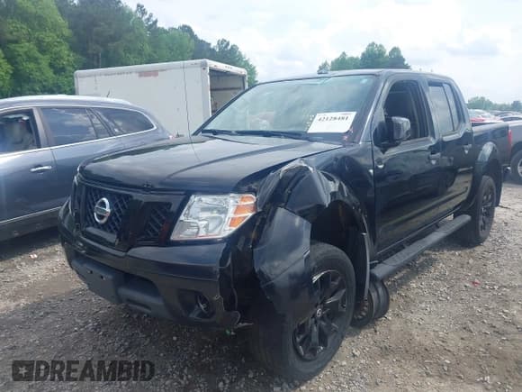 ✅ 2018 Nissan Frontier SV • VIN: 1N6AD0EV0JN744891 • Lot: 42128481. Listed on IAAI with 137,412 mi. Free auction sales archive from the USA and detailed vehicle history report at DreamBid. Image 2.