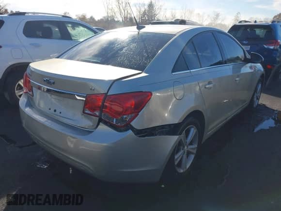 2014 Chevrolet Cruze 2LT with VIN 1G1PE5SBXE7257699, listed as a IAAI auction lot 43514227 with 131,115 mi miles and . Bid and sale history available at DreamBid. Image 4.