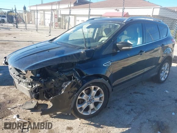 ✅ 2016 Ford Escape Titanium • VIN: 1FMCU0J90GUA15059 • Лот: 43526955. Опубликован ранее на IAAI с пробегом 163 883 миль. Бесплатный доступ к архиву аукционных продаж из США и подробный отчёт об истории автомобиля на DreamBid. Изображение 2.