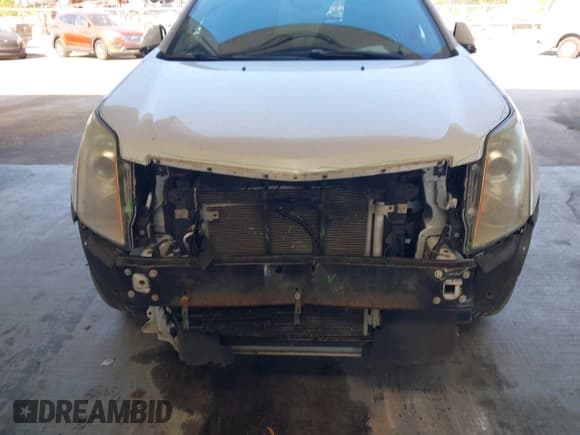 ✅ 2016 Cadillac SRX Performance Collection • VIN: 3GYFNCE30GS565930 • Lot: 43711639. Listed on IAAI with 112,092 mi. Free auction sales archive from the USA and detailed vehicle history report at DreamBid. Image 6.