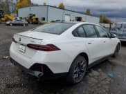 ✅ 2024 BMW i5 eDrive40 • VIN: WBY33FK09RCS00390 • Lot: 79174764. Listed on Copart with 1,715 mi. Free auction sales archive from the USA and detailed vehicle history report at DreamBid. Image 3.