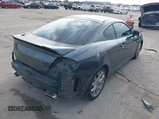 2007 Hyundai Tiburon GT z VIN KMHHN66F47U238578, wystawiony jako IAAI lot #41577890 z przebiegiem 182 186 mil mil oraz . Historia ofert i sprzedaży dostępna na DreamBid. Obrazek 4.