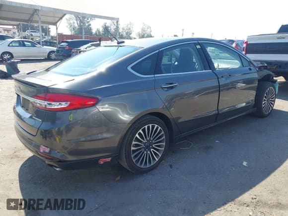 ✅ 2018 Ford Fusion Titanium • VIN: 3FA6P0SU7JR191820 • Lot: 42894692. Listed on IAAI with 40,542 mi. Free auction sales archive from the USA and detailed vehicle history report at DreamBid. Image 4.