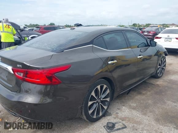 ✅ 2016 Nissan Maxima S • VIN: 1N4AA6AP7GC401110 • Lot: 42653301. Listed on IAAI with 76,609 mi. Free auction sales archive from the USA and detailed vehicle history report at DreamBid. Image 4.