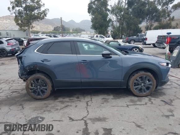 ✅ 2022 Mazda CX-30 S Carbon Edition • VIN: 3MVDMBCL0NM456154 • Lot: 42153202. Listed on IAAI with 40,372 mi. Free auction sales archive from the USA and detailed vehicle history report at DreamBid. Image 13.