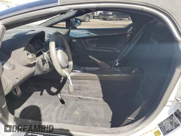 ✅ 2013 Lamborghini Gallardo • VIN: ZHWGU8AJ7DLA12671 • Lot: 75721804. Listed on Copart with 14,849 mi. Free auction sales archive from the USA and detailed vehicle history report at DreamBid. Image 7.