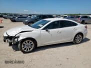 ✅ 2015 Mazda 6 i Sport • VIN: JM1GJ1U54F1190282 • Lot: 65852095. Listed on Copart with 166,186 mi. Free auction sales archive from the USA and detailed vehicle history report at DreamBid. Image 1.