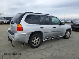 ✅ 2009 GMC Envoy SLE • VIN: 1GKDS33S992104714 • Лот: 81955015. Опубликован ранее на Copart с пробегом 273 113 миль. Бесплатный доступ к архиву аукционных продаж из США и подробный отчёт об истории автомобиля на DreamBid. Изображение 3.