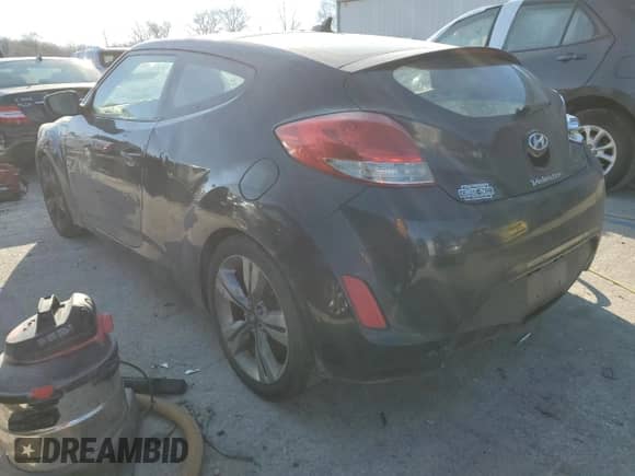 2012 Hyundai Veloster w/Red Int z VIN KMHTC6AD5CU030242, wystawiony jako Copart lot #83016604 z przebiegiem 142 555 mil mil oraz Szkoda całkowita • Salvage title. Historia ofert i sprzedaży dostępna na DreamBid. Obrazek 2.