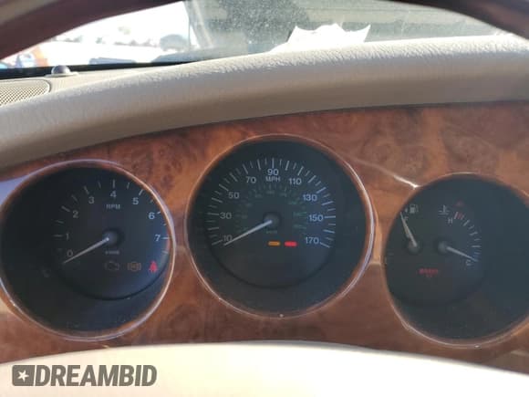 ✅ 2002 Jaguar XK • VIN: SAJDA42C82NA26174 • Лот: 82250765. Опубликован ранее на Copart с пробегом Не указан. Бесплатный доступ к архиву аукционных продаж из США и подробный отчёт об истории автомобиля на DreamBid. Изображение 9.