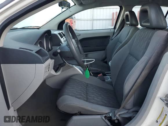 2007 Dodge Caliber с VIN 1B3HB28B97D269827, выставлен на аукционе Copart как лот 76576124 с пробегом 199 053 миль миль и На запчасти • Non repairable. История ставок и продаж доступна на DreamBid. Изображение 7.