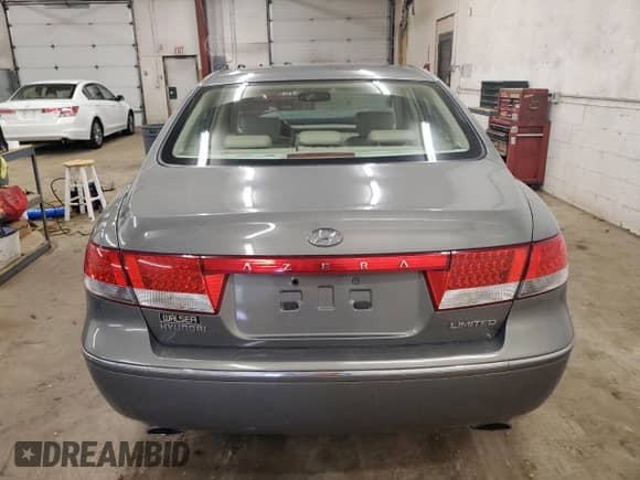 2007 Hyundai Azera SE с VIN KMHFC46FX7A183539, выставлен на аукционе Copart как лот 54205265 с пробегом 154 942 миль миль и На запчасти • Non repairable. История ставок и продаж доступна на DreamBid. Изображение 6.