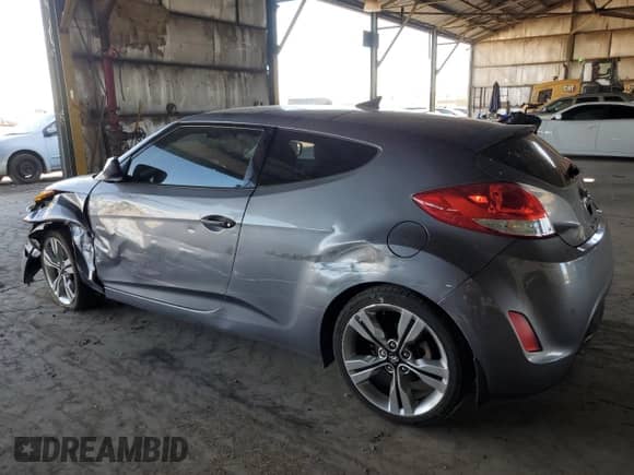 2015 Hyundai Veloster z VIN KMHTC6AD1FU232550, wystawiony jako Copart lot #69808314 z przebiegiem 97 915 mil mil oraz Szkoda całkowita • Salvage title. Historia ofert i sprzedaży dostępna na DreamBid. Obrazek 2.