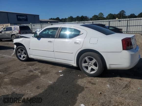 2010 Dodge Charger SXT с VIN 2B3CA3CV3AH307678, выставлен на аукционе Copart как лот 76708794 с пробегом 185 873 миль миль и Списание • Salvage title. История ставок и продаж доступна на DreamBid. Изображение 2.