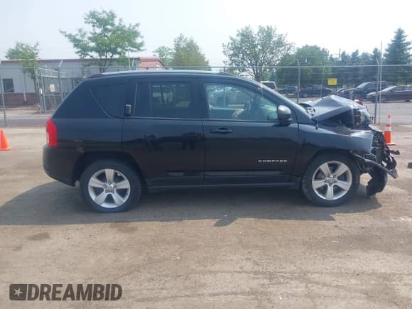✅ 2013 Jeep Compass Latitude • VIN: 1C4NJCEB9DD166157 • Lot: 42734289. Listed on IAAI with 165,785 mi. Free auction sales archive from the USA and detailed vehicle history report at DreamBid. Image 13.