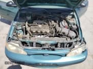 ✅ 1998 Ford Escort SE • VIN: 3FAFP15P5WR230715 • Lot: 58982595. Listed on Copart with 112,250 mi. Free auction sales archive from the USA and detailed vehicle history report at DreamBid. Image 11.