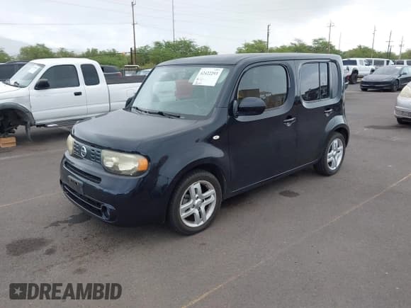 ✅ 2014 Nissan Cube S • VIN: JN8AZ2KR3ET352811 • Lot: 42422293. Listed on IAAI with 86,251 mi. Free auction sales archive from the USA and detailed vehicle history report at DreamBid. Image 2.