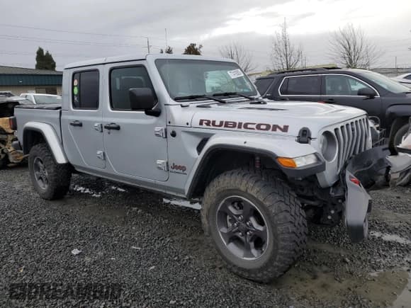 ✅ 2022 Jeep Gladiator Rubicon • VIN: 1C6JJTBM0NL145006 • Лот: 77419303. Опубликован ранее на Copart с пробегом 9 530 миль. Бесплатный доступ к архиву аукционных продаж из США и подробный отчёт об истории автомобиля на DreamBid. Изображение 4.