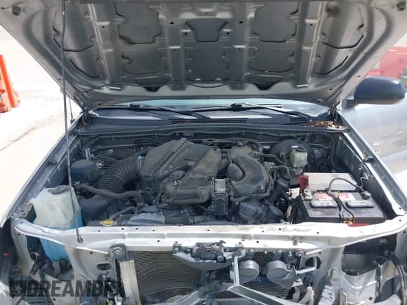 ✅ 2014 Toyota Tacoma PreRunner • VIN: 3TMJU4GN1EM173354 • Lot: 42021686. Listed on IAAI with 101,138 mi. Free auction sales archive from the USA and detailed vehicle history report at DreamBid. Image 10.