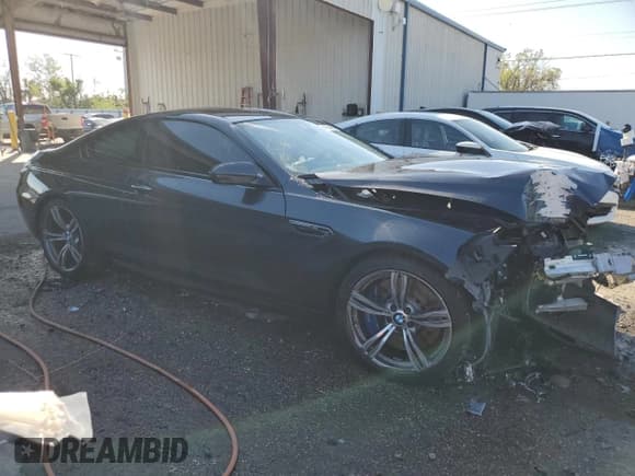 ✅ 2015 BMW M6 • VIN: WBSLX9C59FD160716 • Lot: 47144925. Listed on Copart with 55,535 mi. Free auction sales archive from the USA and detailed vehicle history report at DreamBid. Image 4.