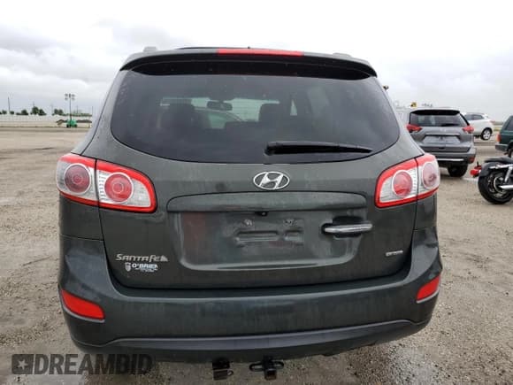 ✅ 2012 Hyundai Santa Fe Limited • VIN: 5XYZK4AG1CG115502 • Lot: 75128574. Listed on Copart with 101,155 mi. Free auction sales archive from the USA and detailed vehicle history report at DreamBid. Image 6.