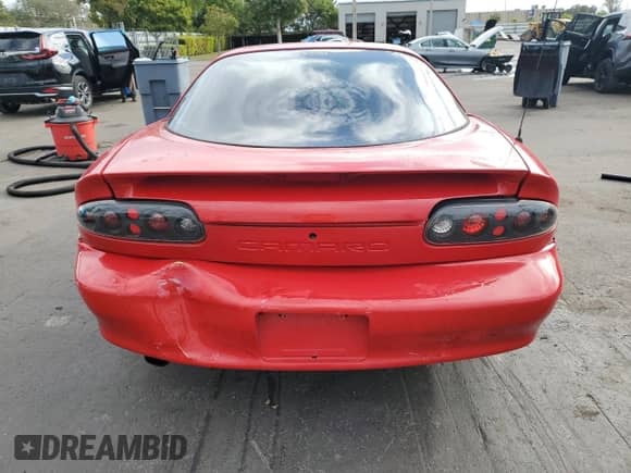 2002 Chevrolet Camaro z VIN 2G1FP22K422133841, wystawiony jako Copart lot #85930284 z przebiegiem 161 241 mil mil oraz Nie do naprawy • Non repairable. Historia ofert i sprzedaży dostępna na DreamBid. Obrazek 6.