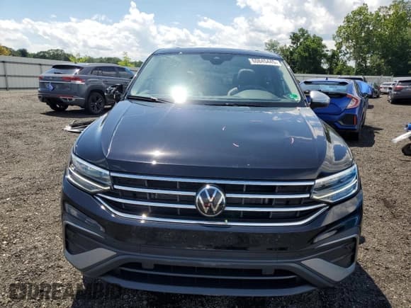 ✅ 2024 Volkswagen Tiguan Wolfsburg Edition • VIN: 3VVAB7AX2RM229276 • Lot: 60845445. Listed on Copart with 859 mi. Free auction sales archive from the USA and detailed vehicle history report at DreamBid. Image 5.