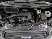 ✅ 2015 Ford Transit Cargo • VIN: 1FTYE1YM2FKA21561 • Лот: 86949274. Опубликован ранее на Copart с пробегом 160 535 миль. Бесплатный доступ к архиву аукционных продаж из США и подробный отчёт об истории автомобиля на DreamBid. Изображение 14.