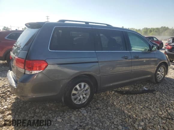 ✅ 2010 Honda Odyssey EX-L • VIN: 5FNRL3H79AB106953 • Lot: 62196755. Listed on Copart with 166,862 mi. Free auction sales archive from the USA and detailed vehicle history report at DreamBid. Image 3.